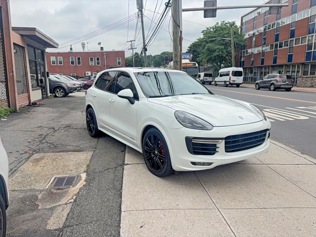 2016 Porsche Cayenne VIN WP1AD2A21GLA79142 COPART salvage auction — Normal Wear, NY - CERT OF TITLE-REBUILT SALVAGE (P), sold $1,500 on 2026-06-30 (photo 1)