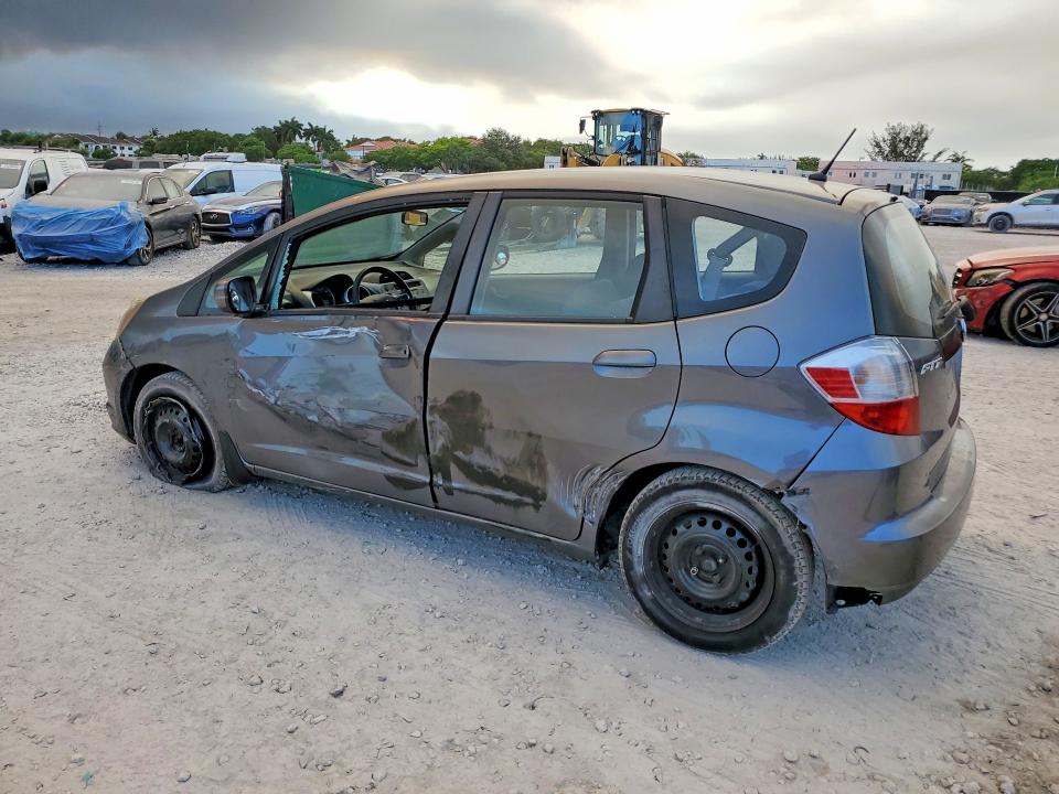 2013 Honda Fit VIN JHMGE8H35DC021104 COPART salvage auction — SIDE, Fl - Cert Of Title Slvg Rebuildable, sold $1,550 on 2026-07-14 (photo 2)