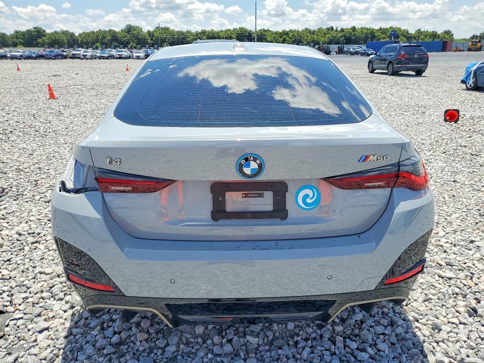2024 BMW I4 VIN WBY33AW01RFS33055 COPART salvage auction — REAR END, Fl - Certificate Of Destruction, sold $24,300 on 2026-07-31 (photo 6)