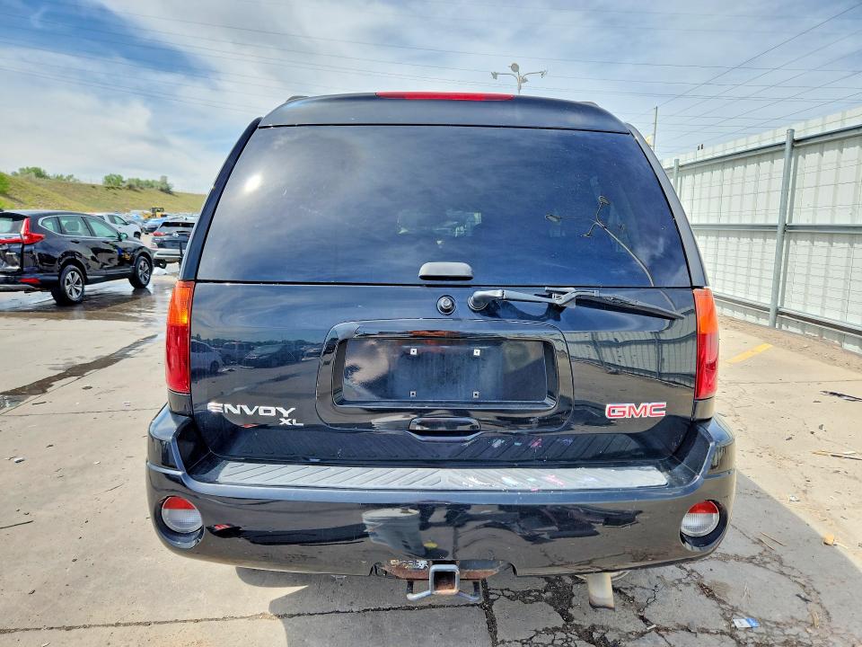 2006 Gmc Envoy VIN 1GKET16S866103110 COPART salvage auction — VANDALISM, CO - CERTIFICATE OF TITLE, sold $250 on 2026-07-22 (photo 6)