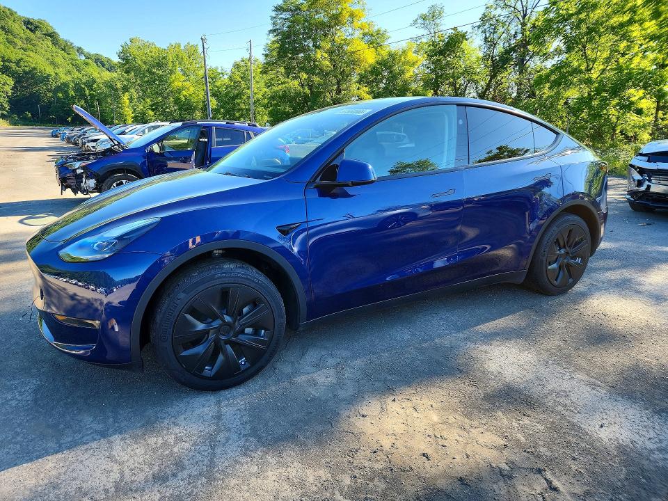 2023 Tesla Model y VIN 7SAYGDEE4PF827086 COPART salvage auction — SIDE, Nj - Cert Of Title-Salvage, sold $12,800 on 2026-07-07 (photo 1)