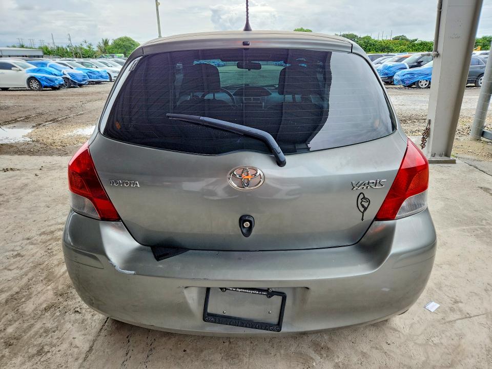 2010 Toyota Yaris VIN JTDKT4K38A5283489 COPART salvage auction — FRONT END, Fl - Cert Of Title Slvg Rebuildable, sold $350 on 2026-07-21 (photo 6)