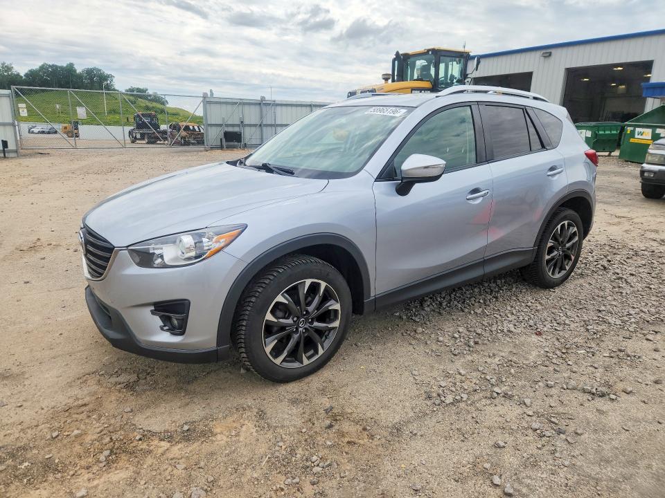 2016 Mazda Cx-5 VIN JM3KE4DY0G0839729 COPART salvage auction — SIDE, WI - CERTIFICATE OF TITLE, sold $3,800 on 2026-07-14 (photo 1)