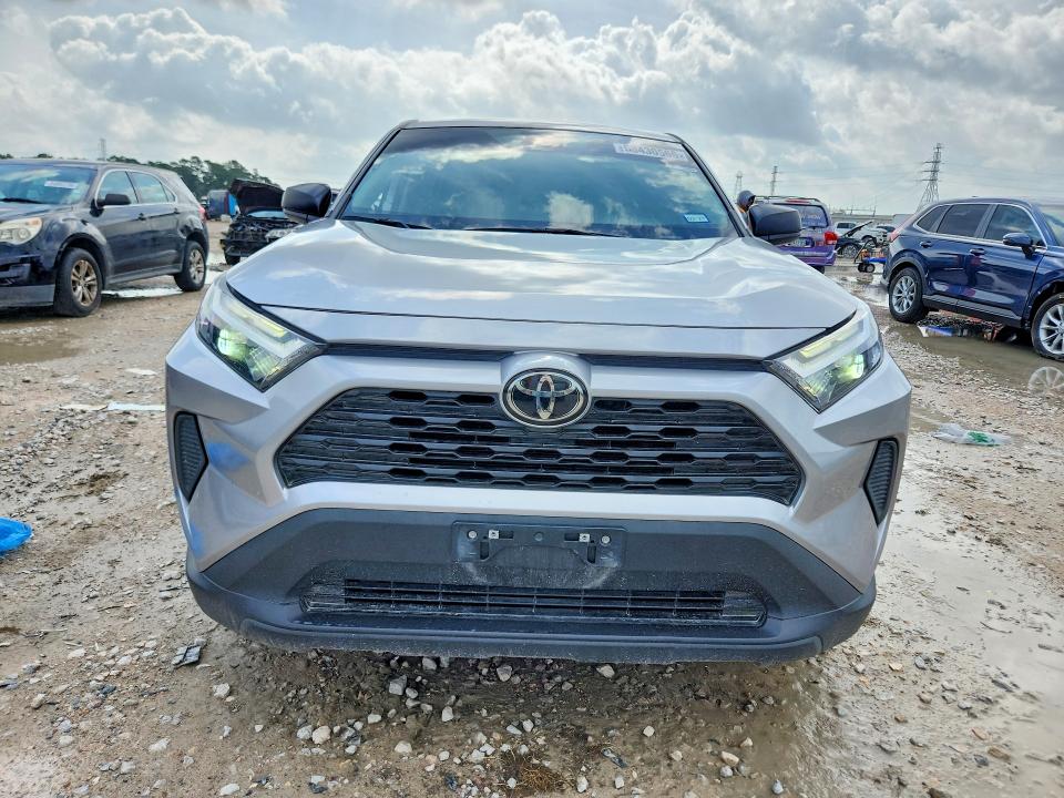 2025 Toyota Rav4 VIN 2T3H1RFV4SC319070 COPART salvage auction — SIDE, Tx - Salvage Vehicle Title, sold $11,800 on 2026-07-02 (photo 5)