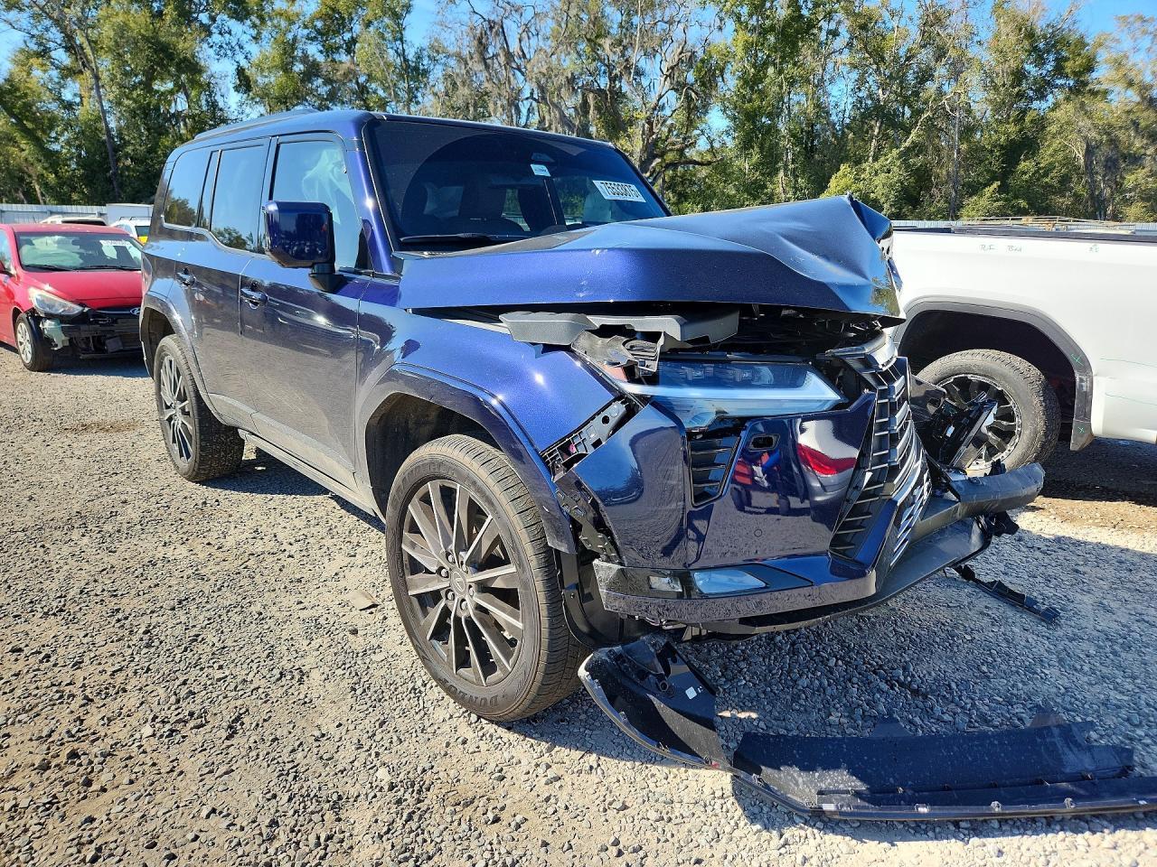 2025 Lexus GX 550 VIN JTJVBCDX4S5067051 COPART salvage auction — Front End, FL - CERT OF TITLE SLVG REBUILDABLE (P), sold $32,750 on 2026-07-07 (photo 4)