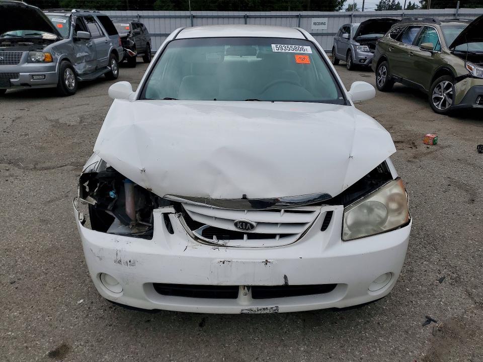 2005 Kia Spectra VIN KNAFE121855139338 COPART salvage auction — FRONT END, Wa - Bill Of Sale, sold $250 on 2026-07-06 (photo 5)