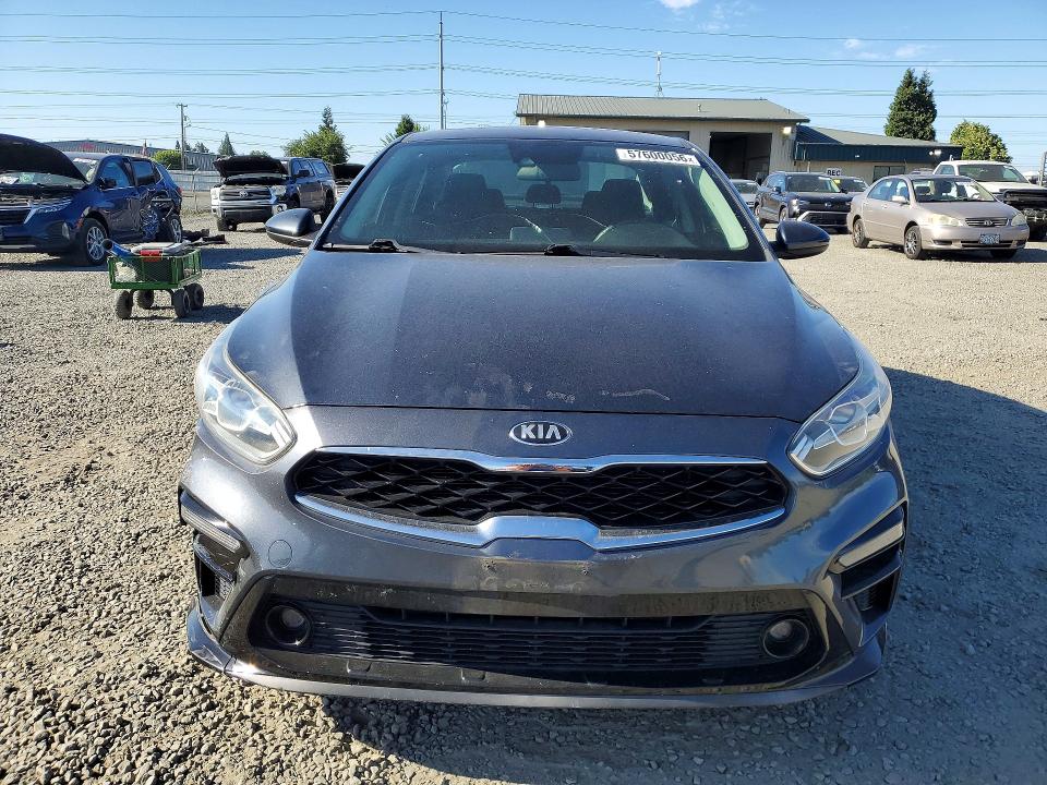 2019 Kia VIN 3KPF34AD7KE023036 COPART salvage auction — SIDE, Or - Salvage Title Certificate, sold $4,200 on 2026-08-29 (photo 5)