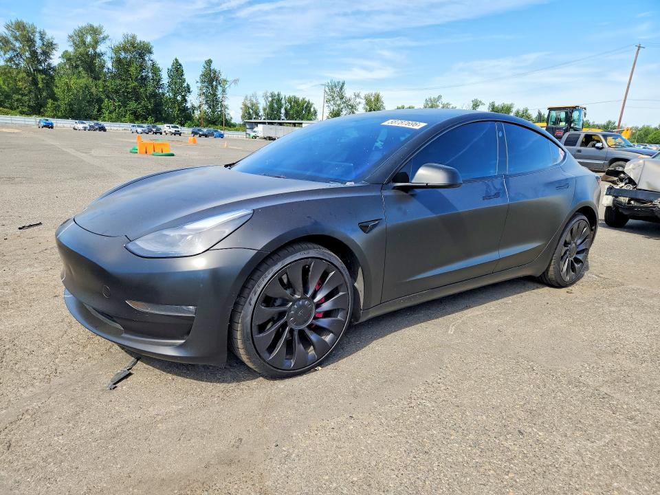 2022 Tesla Model 3 VIN 5YJ3E1EC7NF129773 COPART salvage auction — SIDE, Or - Salvage Title Certificate, sold $1,050 on 2026-07-29 (photo 1)