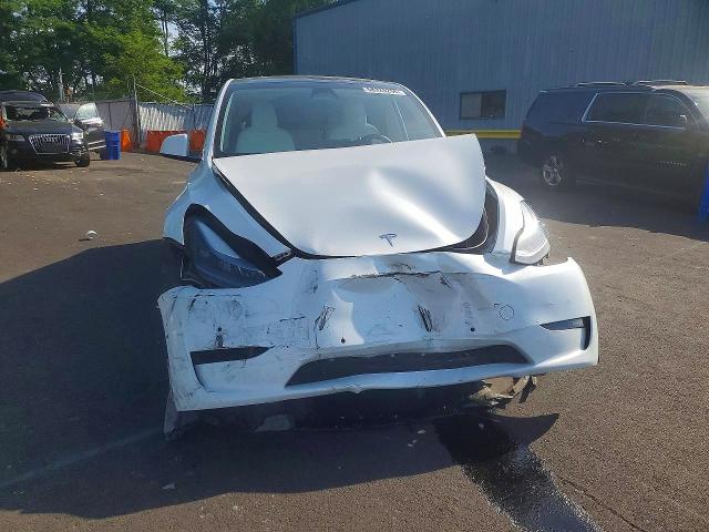 2022 Tesla VIN 7SAYGDEEXNF517330 COPART salvage auction — FRONT END, Or - Salvage Title Certificate, sold $125 on 2026-07-29 (photo 5)