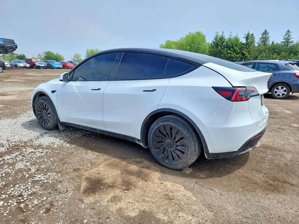 2023 Tesla Model y VIN LRWYGDFDXPC901706 COPART salvage auction — REAR END, On - Permit Salvage, sold $6,600 on 2026-07-28 (photo 2)