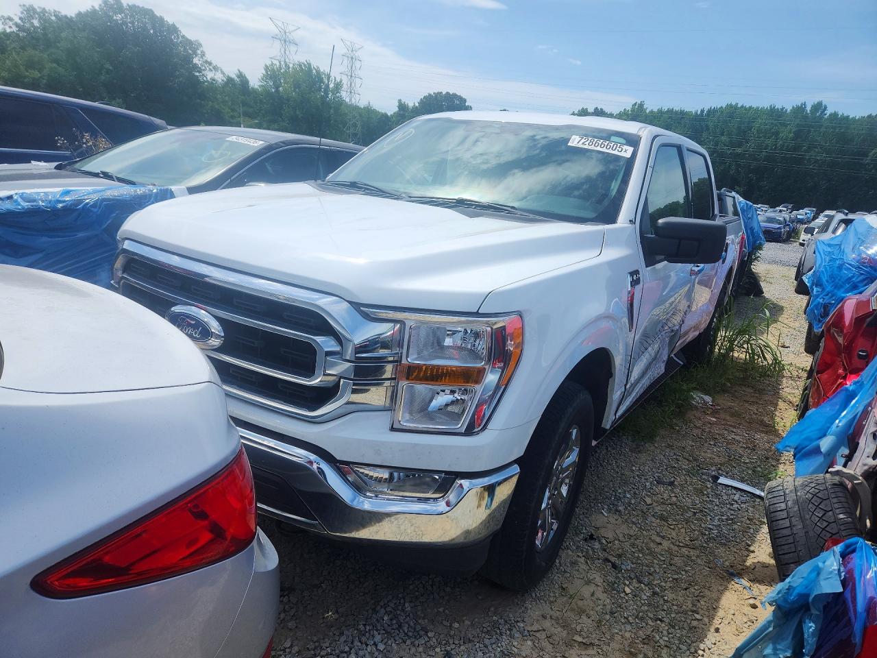 2023 Ford F-150 Lightning VIN 1FTEW1EP2PKD32567 COPART salvage auction — Side, TN - SALVAGE CERTIFICATE, sold $14,800 on 2026-07-03 (photo 1)