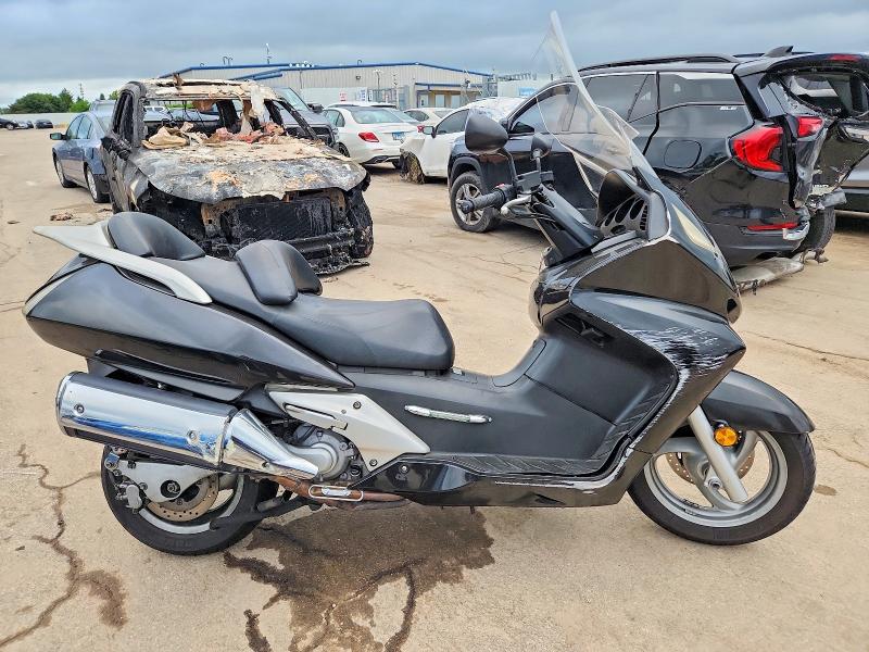 2004 Honda Silver wing VIN JH2PF01184K201103 COPART salvage auction — SIDE, IL - SALVAGE CERTIFICATE, sold $275 on 2026-07-23 (photo 1)