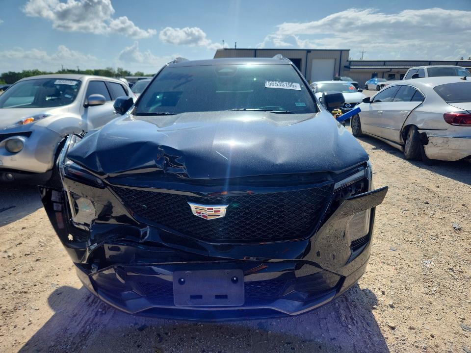 2024 Cadillac Xt4 VIN 1GYFZER49RF242826 COPART salvage auction — FRONT END, TX - SALVAGE VEHICLE TITLE, sold $8,300 on 2026-09-03 (photo 5)