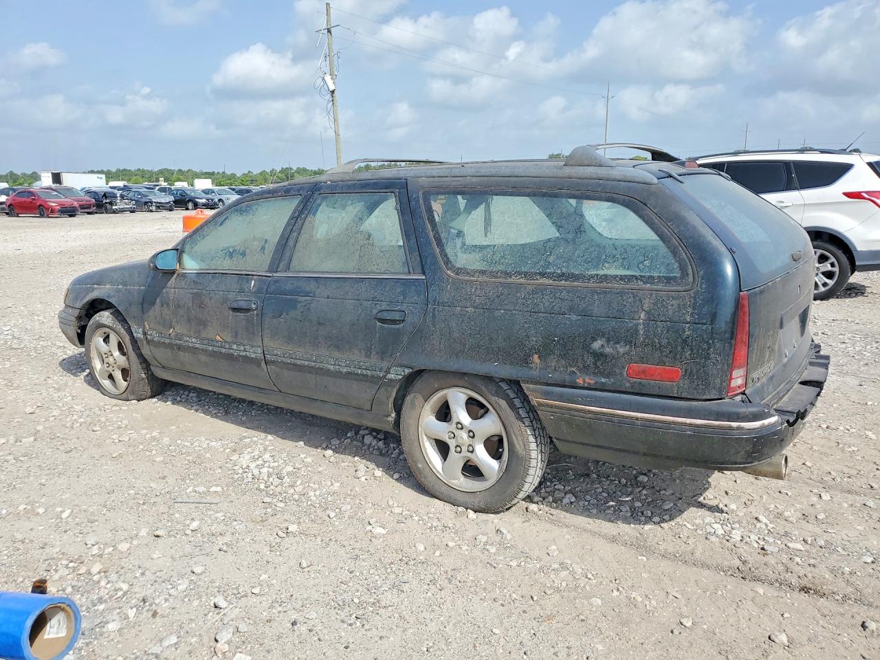 1994 Ford Taurus VIN 1FALP57UXRA217745 COPART salvage auction — Rear End, TX - CERTIFICATE OF TITLE, sold $150 on 2026-07-02 (photo 2)