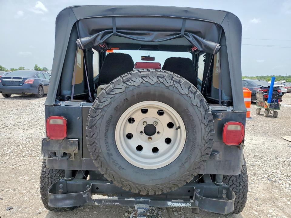 1995 Jeep Wrangler / VIN 1J4FY19P2SP285460 COPART salvage auction — NORMAL WEAR, Tx - Certificate Of Title, sold $1,250 on 2026-07-02 (photo 6)