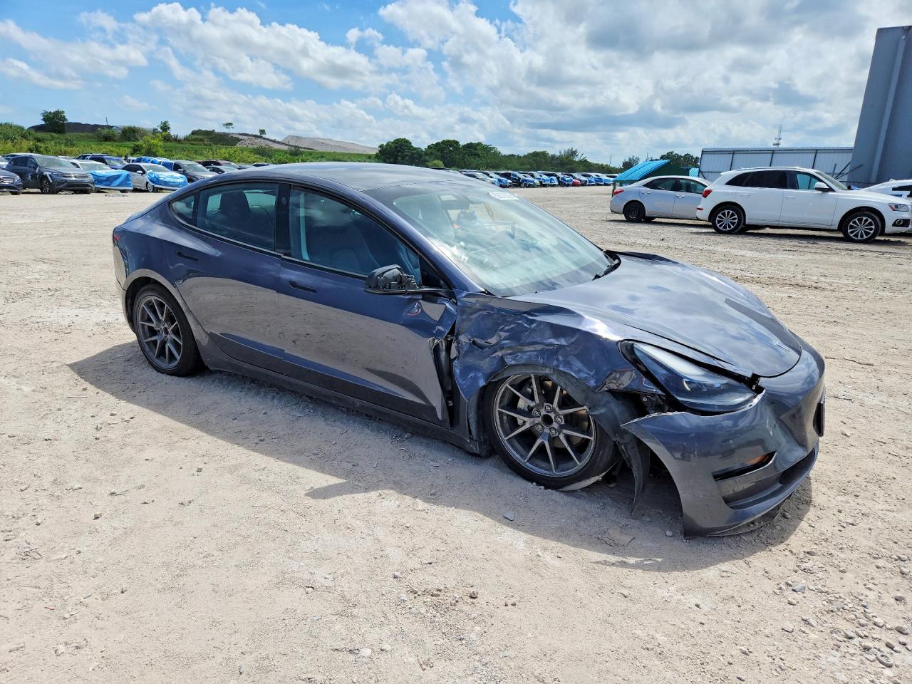 2023 Tesla Model 3 VIN 5YJ3E1EA7PF697474 COPART salvage auction — Side, MD - CERTIFICATE OF TITLE, sold $5,900 on 2026-07-03 (photo 4)