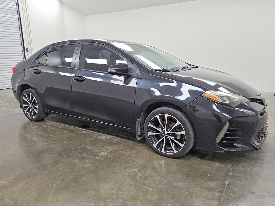 2019 Toyota Corolla VIN 5YFBURHE7KP885792 COPART salvage auction — SIDE, Tx - Cert Of Title-Rebuilt Salvage, sold $3,900 on 2026-07-07 (photo 4)