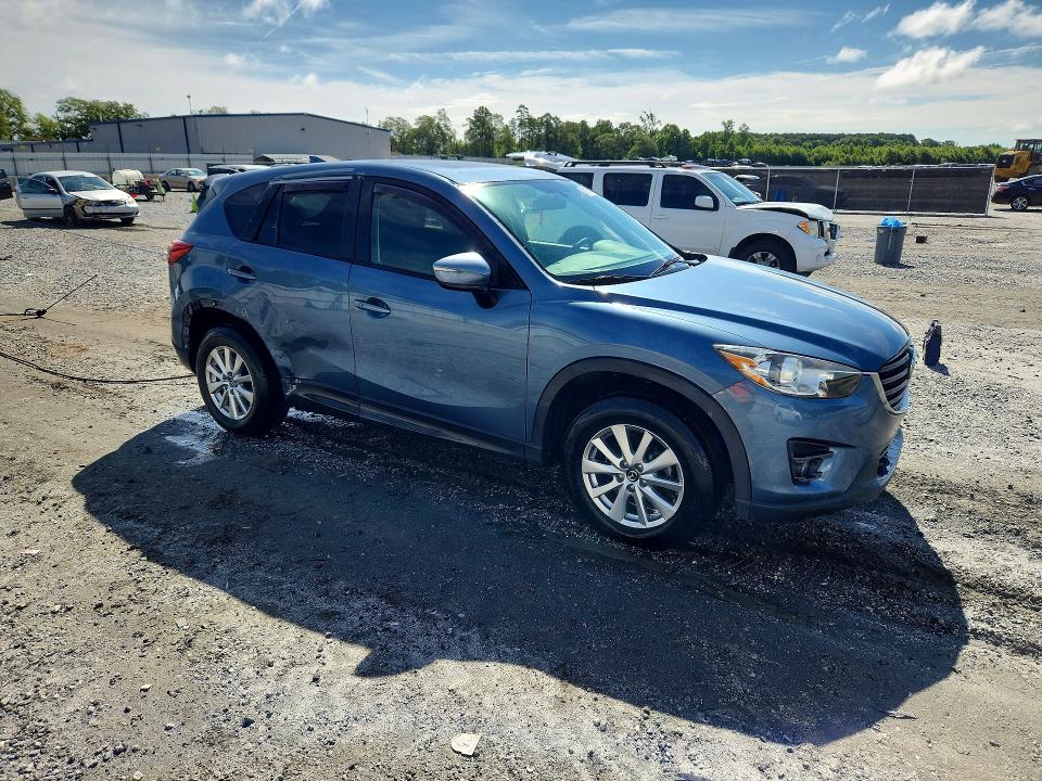 2016 Mazda Cx-5 VIN JM3KE4CY2G0667446 COPART salvage auction — SIDE, Sc - Cert Of Title-Salvage, sold $3,300 on 2026-07-27 (photo 4)