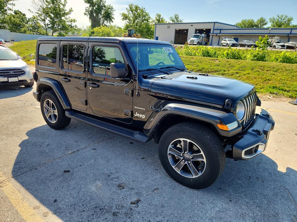 2023 Jeep Wrangler / VIN 1C4HJXEG2PW650454 COPART salvage auction — MINOR DENT/SCRATCHES, Mo - Certificate Of Title, sold $21,250 on 2026-07-02 (photo 4)