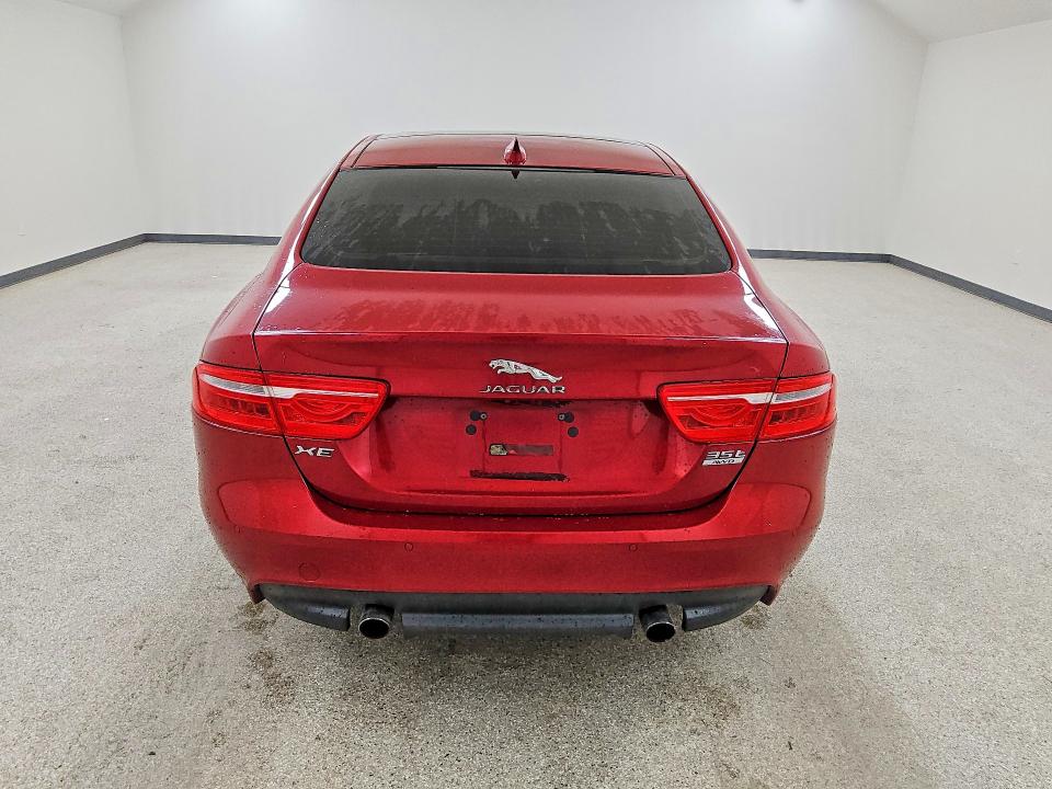 2017 Jaguar Xe VIN SAJAJ4BVXHA969202 COPART salvage auction — MINOR DENT/SCRATCHES, Co - Certificate Of Title, sold $1,450 on 2026-07-07 (photo 6)