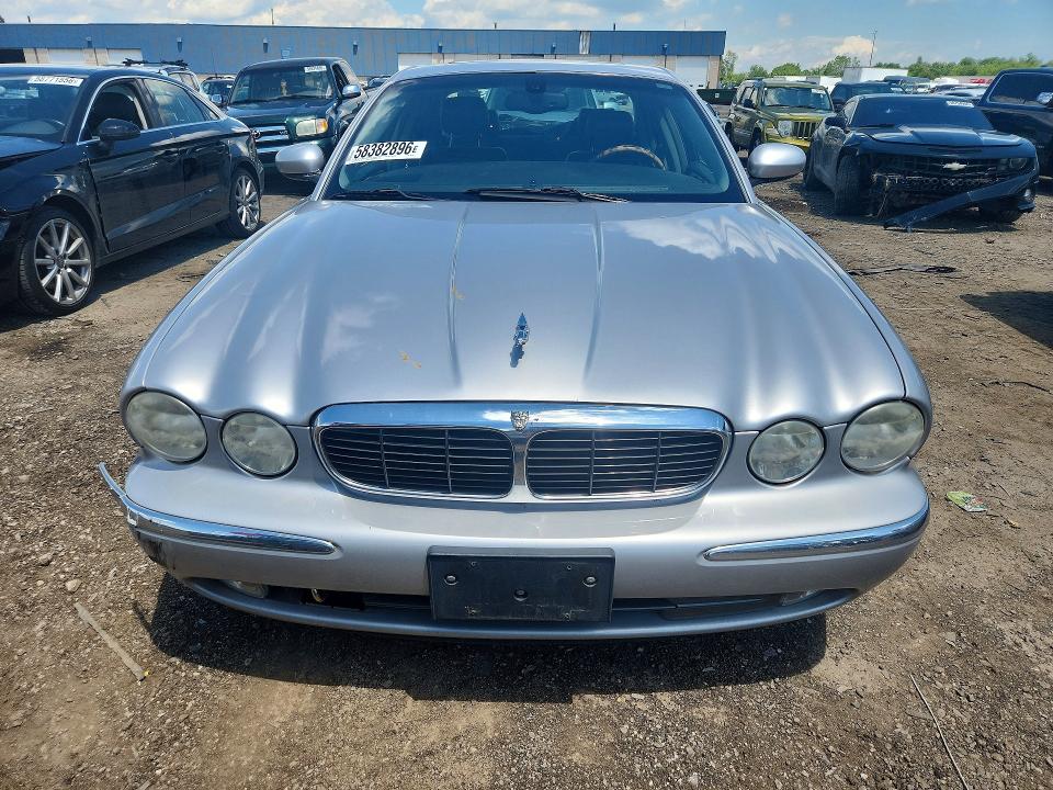 2004 Jaguar Xj series VIN SAJEA71C94SG06738 COPART salvage auction — REAR END, MI - CERTIFICATE OF TITLE, sold $500 on 2026-07-14 (photo 5)