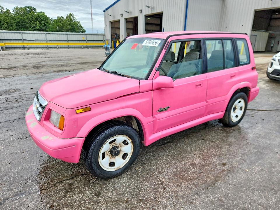 1998 Suzuki Sidekick VIN JS3TD21V3W4109675 COPART salvage auction — HAIL, Mo - Salvage Certificate Of Title, sold $300 on 2026-07-20 (photo 1)