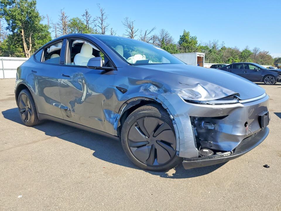 2026 Tesla Model y VIN 7SAYGDEE6TA636518 COPART salvage auction — SIDE, Ny - Mv-907A Salvage Certificate, sold $18,900 on 2026-07-13 (photo 4)