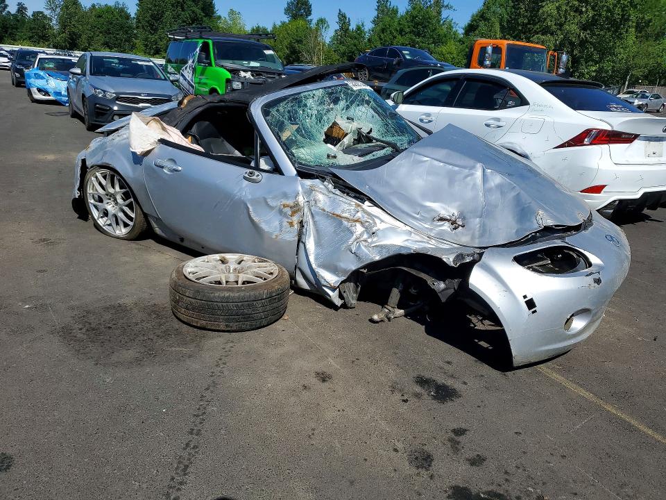2007 Mazda Mx-5 VIN JM1NC25F570131697 COPART salvage auction — ROLLOVER, Or - Wrecker's Notice (Parts Only), sold $350 on 2026-07-13 (photo 4)