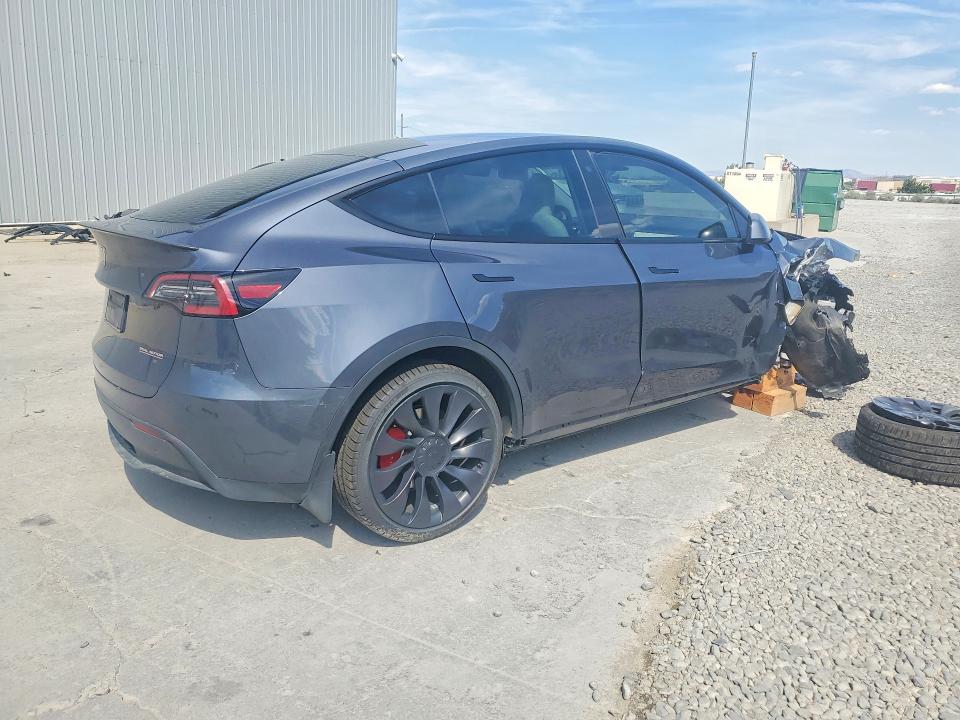 2023 Tesla Model y VIN 7SAYGDEF9PF711908 COPART salvage auction — SIDE, Nv - Salvage Title, sold $10,700 on 2026-07-06 (photo 3)