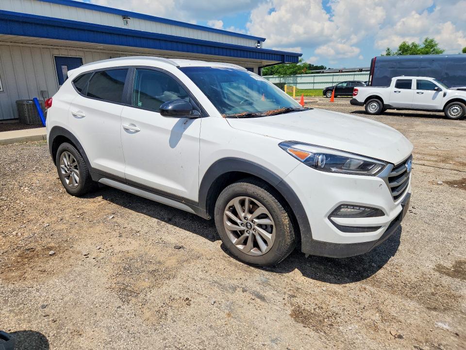 2018 Hyundai Tucson VIN KM8J3CA41JU769692 COPART salvage auction — MINOR DENT/SCRATCHES, Wi - Certificate Of Title, sold $3,650 on 2026-07-21 (photo 4)