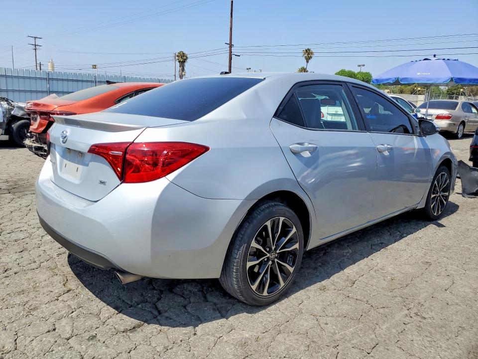 2017 Toyota Corolla VIN 5YFBURHE3HP594005 COPART salvage auction — SIDE, Salvage Title, sold $4,550 on 2026-07-16 (photo 3)