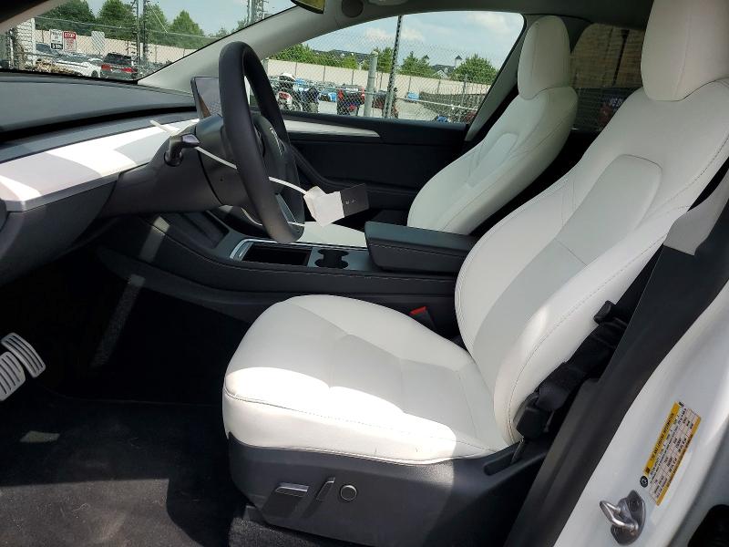 2023 Tesla Model y VIN 7SAYGDEF7PF788423 COPART salvage auction — REAR END, Salvage Title, sold $13,500 on 2026-07-23 (photo 7)