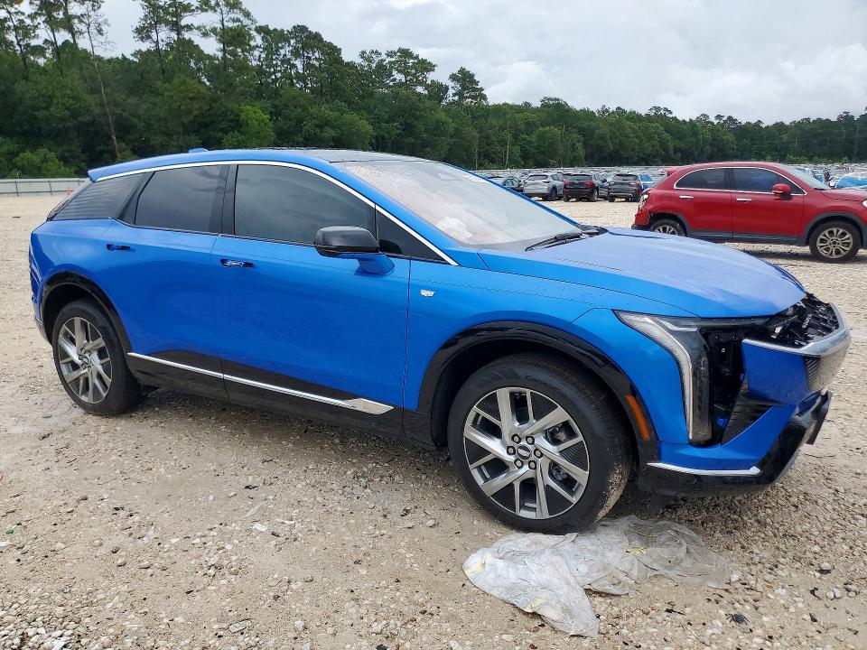 2026 Cadillac Optiq VIN 3GYK3DM40TS123535 COPART salvage auction — UNKNOWN, Tx - Certificate Of Title, sold $8,300 on 2026-10-04 (photo 4)