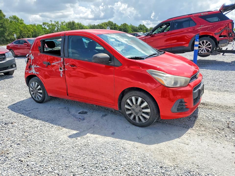 2016 Chevrolet VIN KL8CB6SA4GC585666 COPART salvage auction — SIDE, Salvage Title, sold $125 on 2026-07-27 (photo 4)