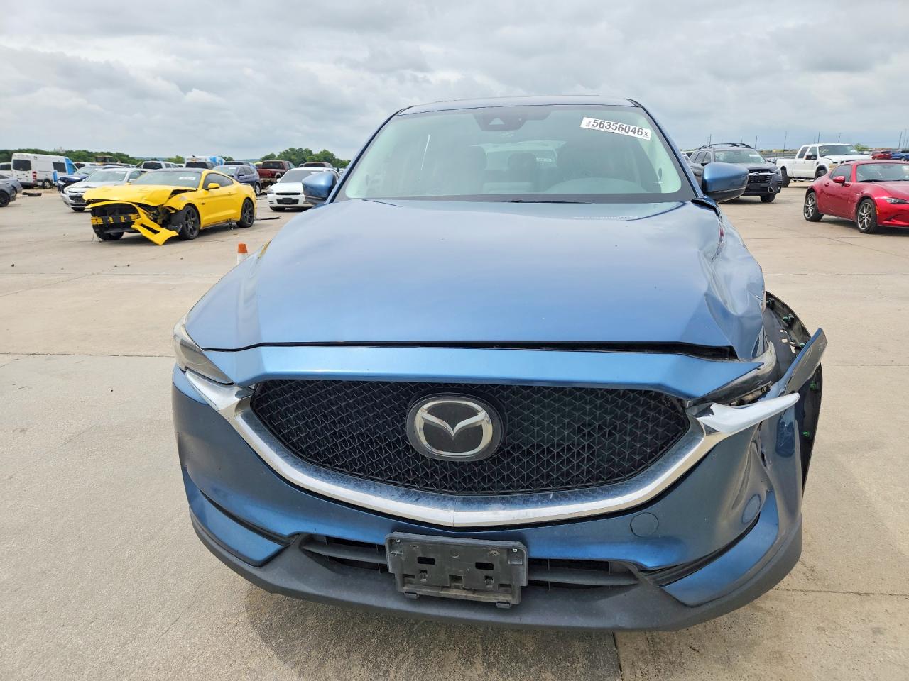 2019 Mazda CX-5 VIN JM3KFADM9K1669737 COPART salvage auction — Side, Sv - Salvage Title, sold $4,750 on 2026-07-09 (photo 5)
