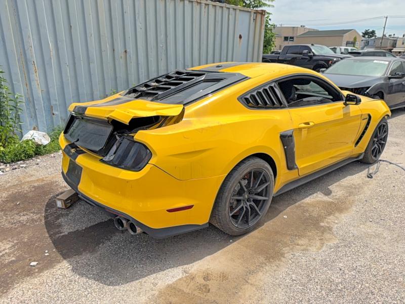 2016 Ford Mustang VIN 1FA6P8JZXG5520579 COPART salvage auction — ENGINE BURN, Id - Salvage Certificate Of Title (P), sold $10,000 on 2026-07-10 (photo 4)