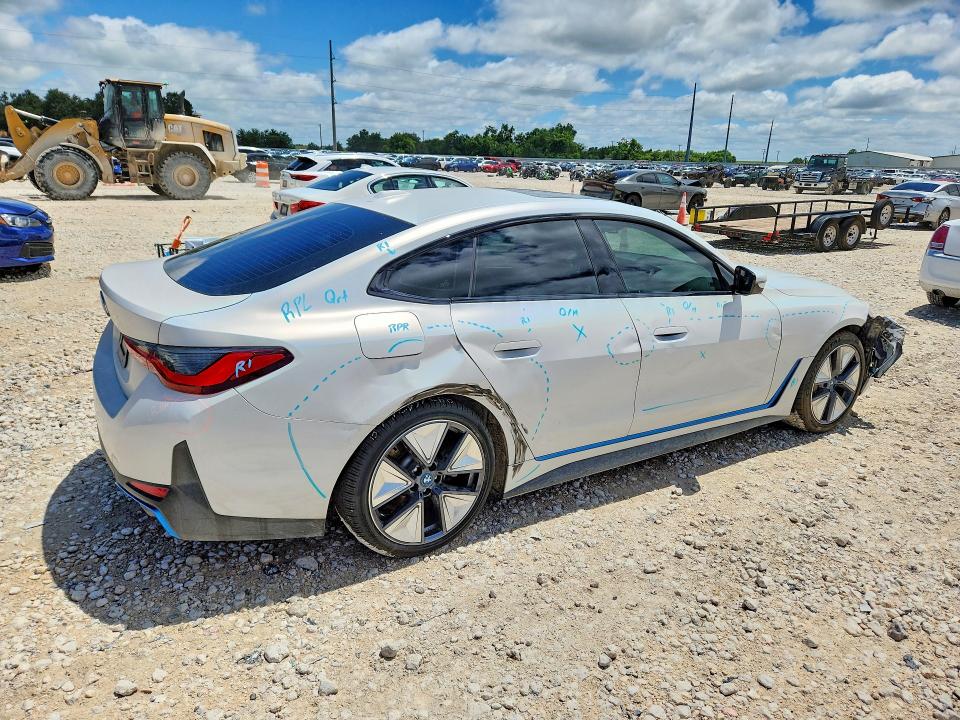 2023 BMW VIN WBY73AW02PFP85873 COPART salvage auction — SIDE, TX - SALVAGE VEHICLE TITLE (P), sold $12,100 on 2026-07-23 (photo 3)