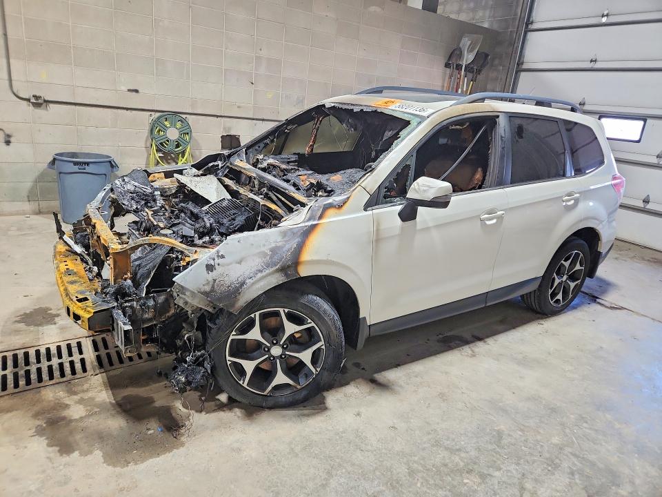 2014 Subaru Forester VIN JF2SJGMC7EH404572 COPART salvage auction — Burn Engine, MN - CERT OF TITLE-PRIOR SALVAGE, sold $500 on 2026-07-07 (photo 1)