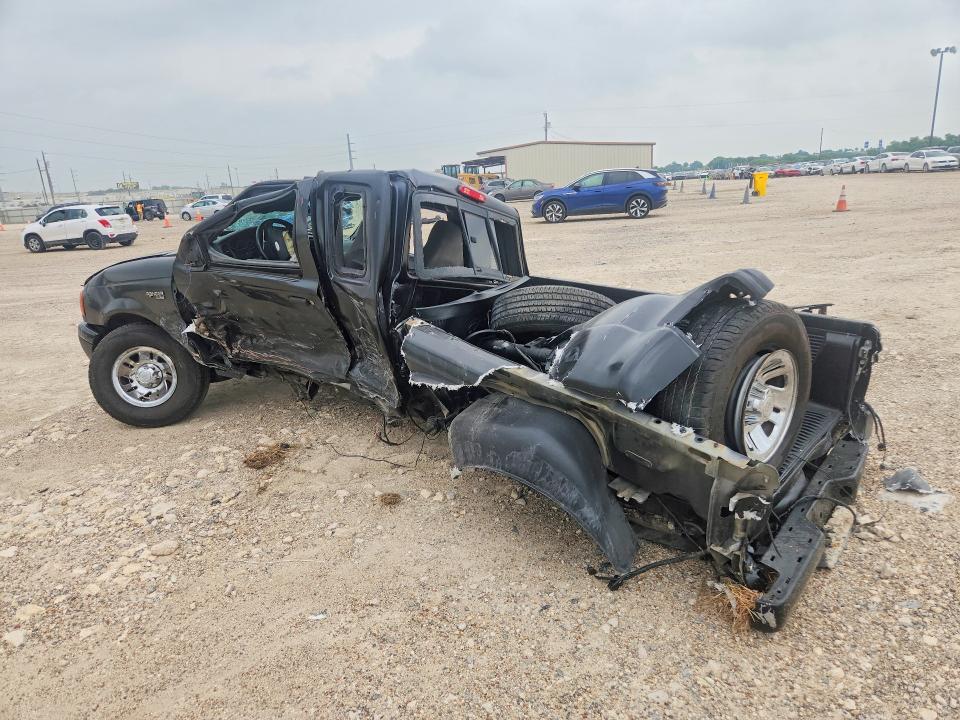 2001 Ford Ranger VIN 1FTYR14U21PA91311 COPART salvage auction — ROLLOVER, TX - NONREPAIRABLE TITLE (P), sold $200 on 2026-07-08 (photo 2)