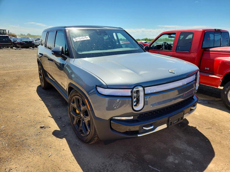 2023 Rivian VIN 7PDSGABA1PN023602 COPART salvage auction — FRONT END, Il - Salvage Certificate, sold $20,000 on 2026-07-13 (photo 4)