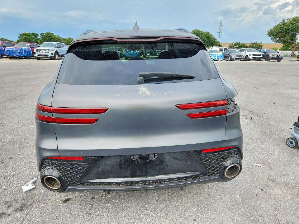 2022 Genesis Gv70 VIN KMUMADTB2NU036689 COPART salvage auction — FRONT END, FL - CERTIFICATE OF TITLE, sold $10,300 on 2026-07-28 (photo 6)