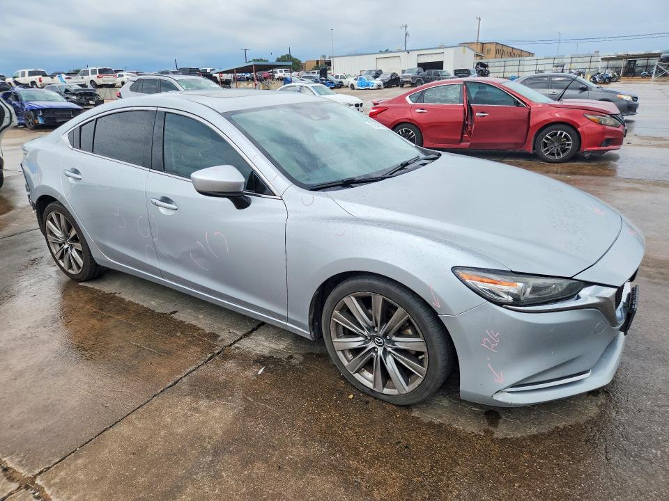 2018 Mazda VIN JM1GL1WY4J1303951 COPART salvage auction — REAR END, TX - SALVAGE VEHICLE TITLE, sold $3,450 on 2026-07-30 (photo 4)