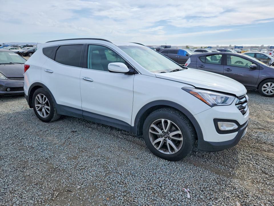 2014 Hyundai Santa fe VIN 5XYZU3LA7EG198532 COPART salvage auction — MINOR DENT/SCRATCHES, Ca - Dis/Dlr/Exp Only Clean Title, sold $2,400 on 2026-07-03 (photo 4)