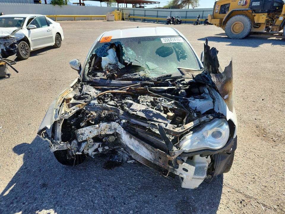 2013 Scion VIN JF1ZNAA13D2713271 COPART salvage auction — FRONT END, Az - Cert Of Title - Salvage, sold $175 on 2026-07-06 (photo 5)