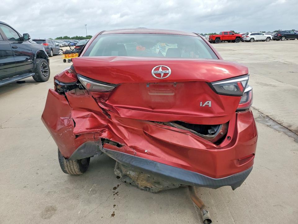 2016 Scion Ia VIN 3MYDLBZV9GY106872 COPART salvage auction — HAIL, Tx - Salvage Vehicle Title, sold $275 on 2026-09-03 (photo 6)