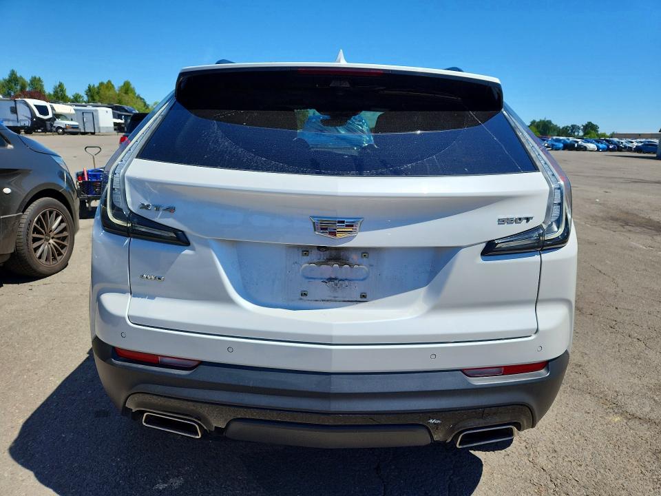 2021 Cadillac Xt4 VIN 1GYFZFR44MF001058 COPART salvage auction — FRONT END, Or - Salvage Title Certificate, sold $3,600 on 2026-08-17 (photo 6)