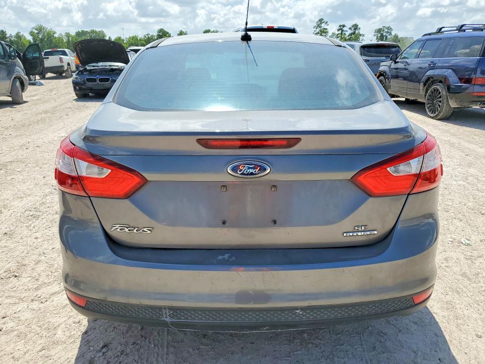 2014 Ford Focus VIN 1FADP3F21EL345430 COPART salvage auction — FRONT END, Tx - Salvage Vehicle Title, sold $900 on 2026-07-10 (photo 6)