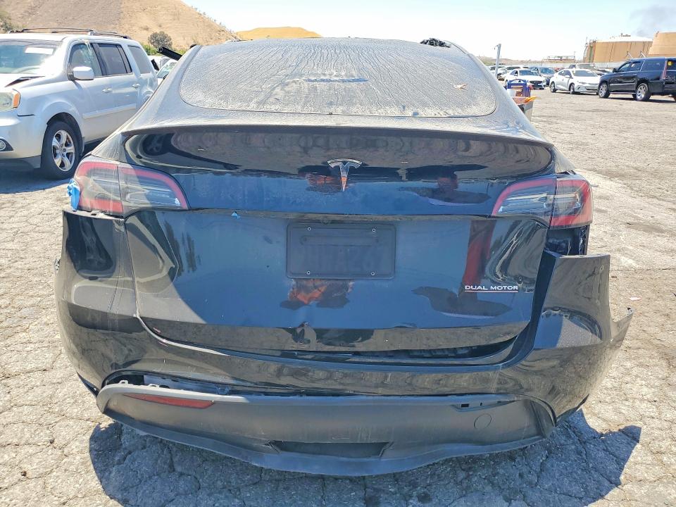 2023 Tesla Model y VIN 7SAYGDEF1PF859745 COPART salvage auction — ALL OVER, CA - SALVAGE CERTIFICATE, sold $1,650 on 2026-07-20 (photo 6)