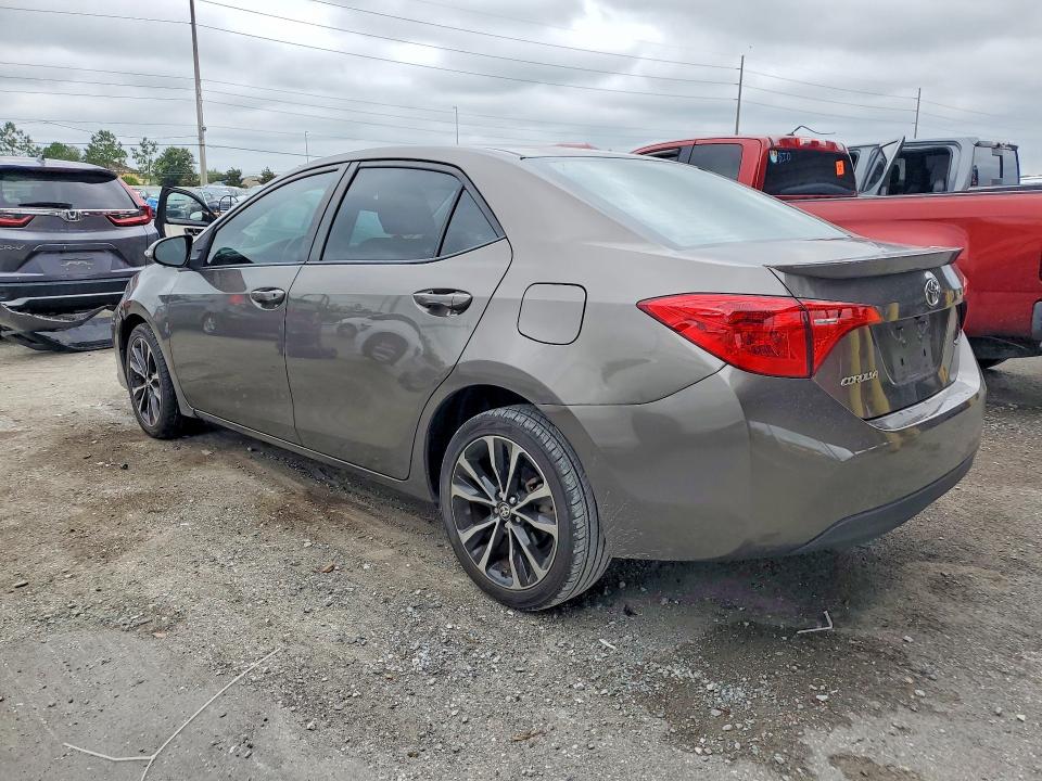 2019 Toyota Corolla VIN 5YFBURHE8KP904883 COPART salvage auction — SIDE, Fl - Cert Of Title Slvg Rebuildable, sold $2,600 on 2026-07-28 (photo 2)