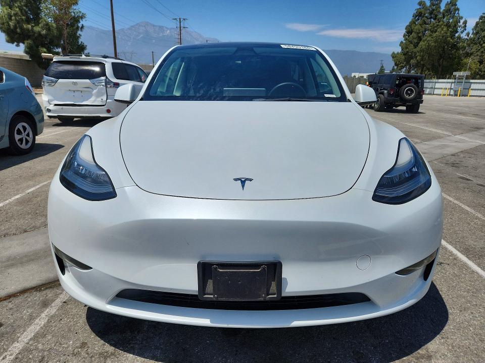 2023 Tesla VIN 7SAYGDEE8PA125107 COPART salvage auction — REAR END, CA - SALVAGE CERTIFICATE, sold $6,700 on 2026-07-28 (photo 5)